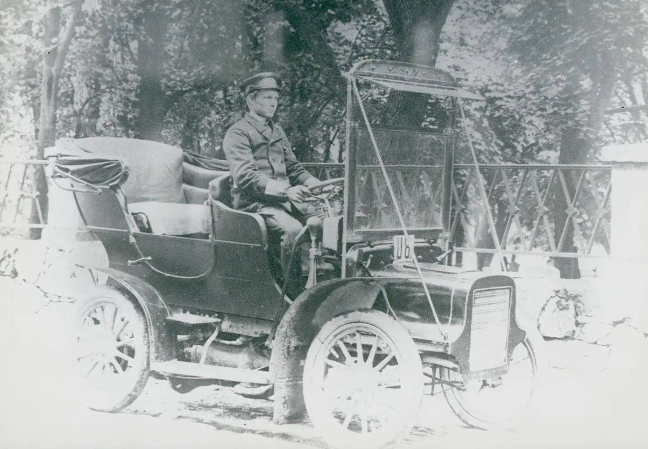 Original black and white archive photograph of an old Cadillac